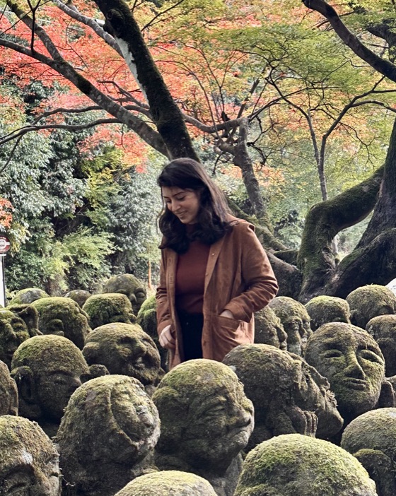Among stone statues